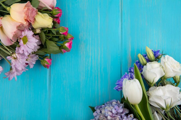 Top view of flowers on blue background