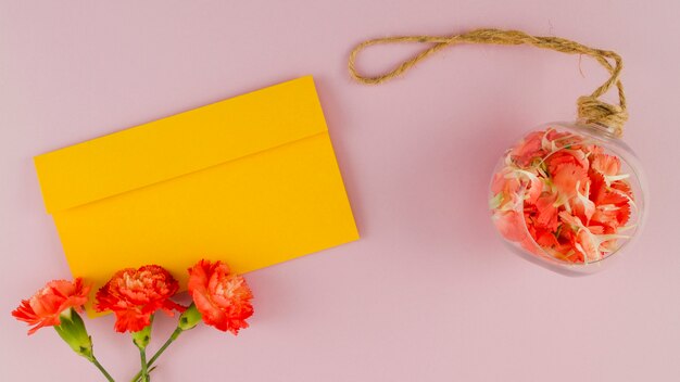 Top view flowers with envelope