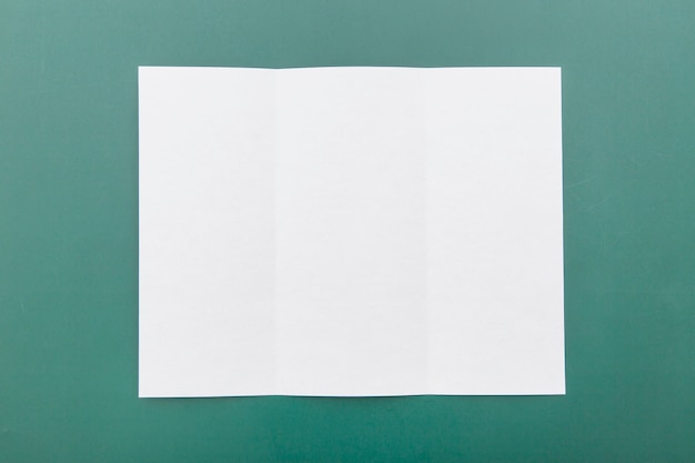 Free photo top view folded white brochure