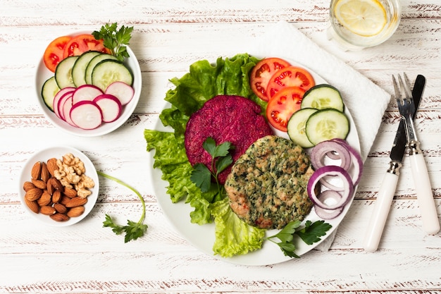 Free photo top view food arrangement on wooden background