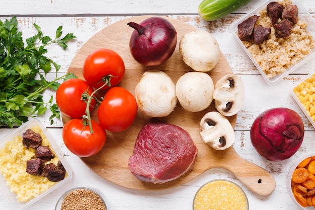 Top view of food concept on wooden table