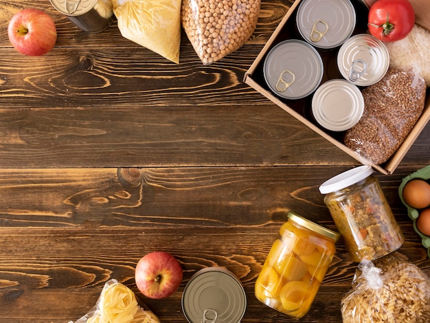 Top view of food for donation with copy space and box