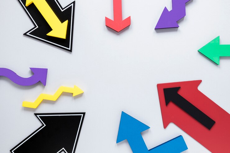 Free Photo top view frame of colorful arrows on white background