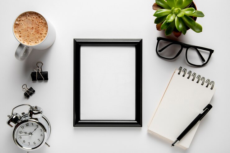 Free Photo top view frame on desk mock-up