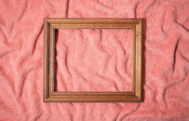 Top view frame on pink blanket