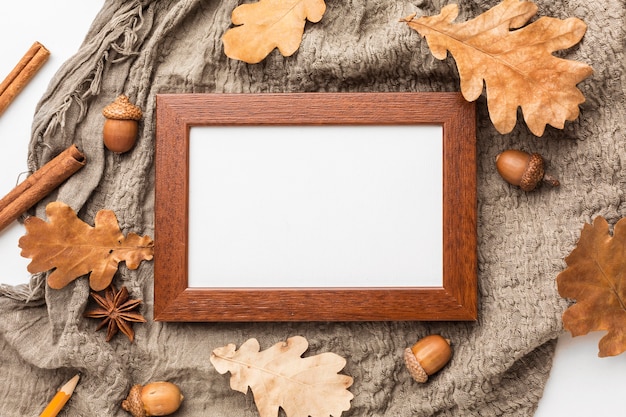 Top view of frame with acorns and autumn leaves