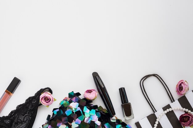 Top view frame with beauty products and copy-space