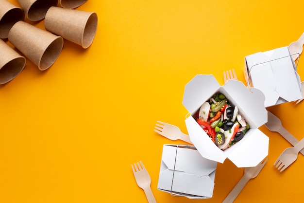 Top view frame with food and cups