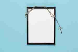 Free photo top view frame with holy necklace