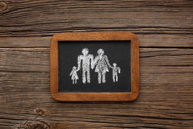 Free photo top view frame with paper cut family