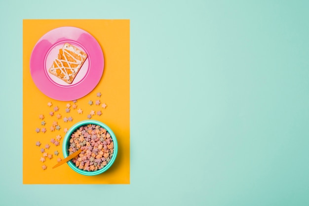 Top view frame with plate and bowl with cereals