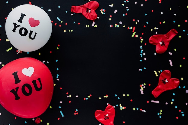 Top view frame with red and white balloons