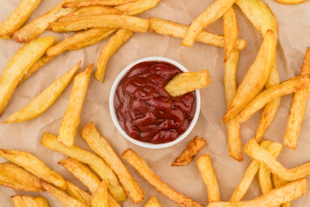 Top view french fries and ketchup