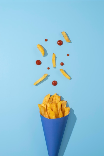 Top view french fries with ketchup