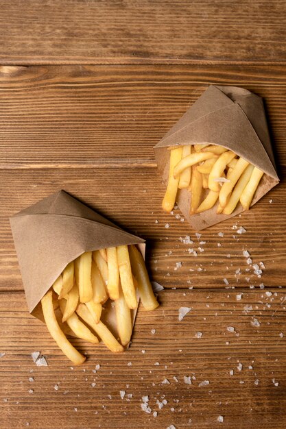 Top view of french fries with salt