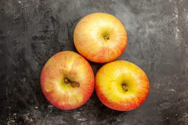 Top view fresh apples on dark background