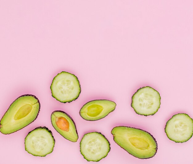 Top view fresh avocado and cucumber slices