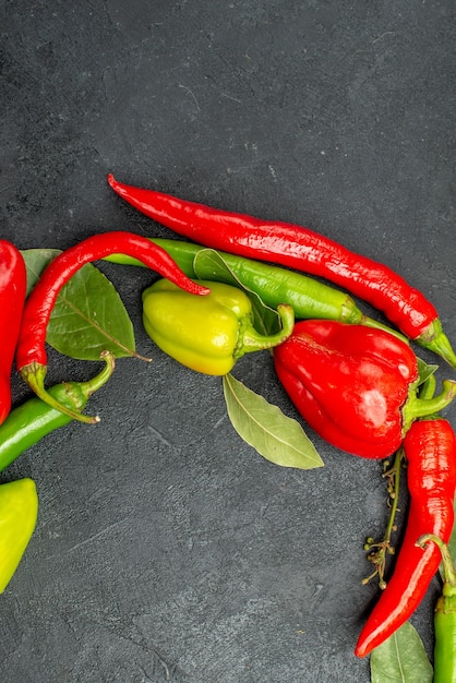 Top view fresh bell-peppers with spicy peppers