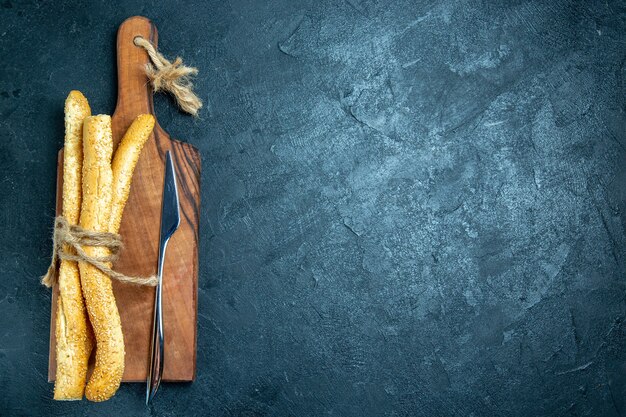 Top view fresh bun breads on a blue space