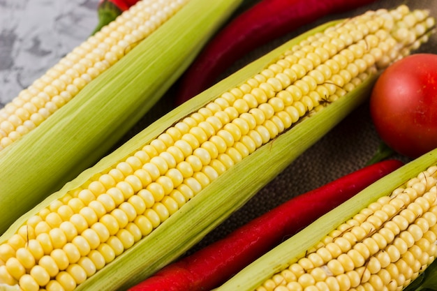 Top view fresh corn and tomatoes