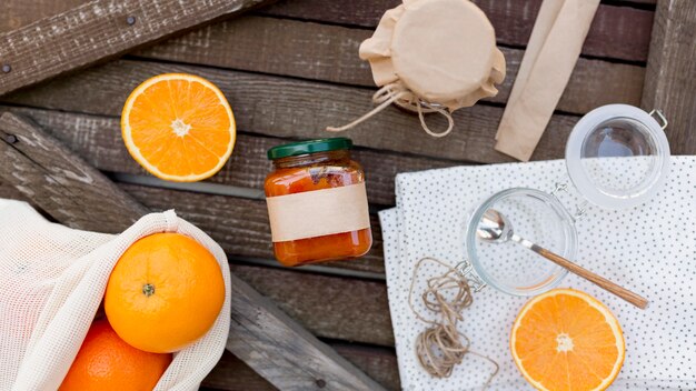 Top view fresh fruit and homemade orange jam