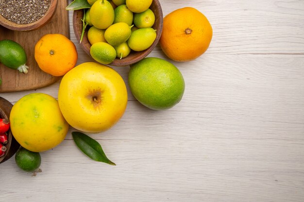 Top view fresh fruits composition different fruits on white background