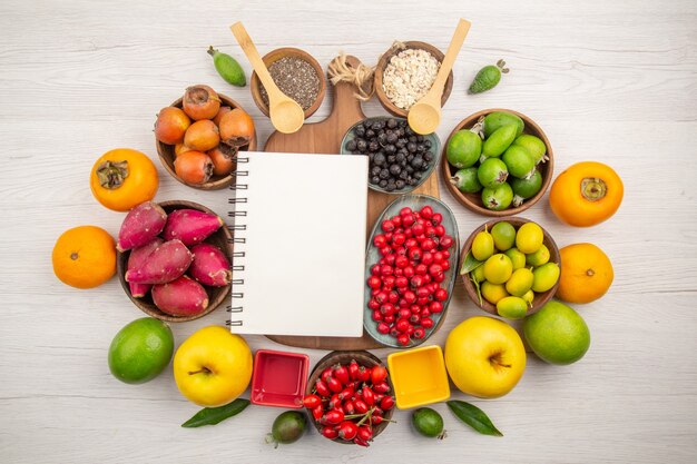 Top view fresh fruits composition different fruits on white background