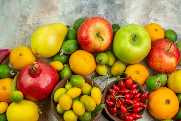 Top view fresh fruits different mellow fruits on white background berry diet tasty color  health ripe tree