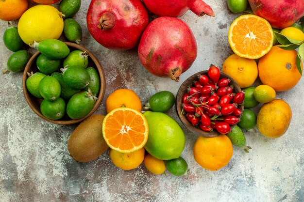 Top view fresh fruits different mellow fruits on white background health tree color  berry ripe tasty