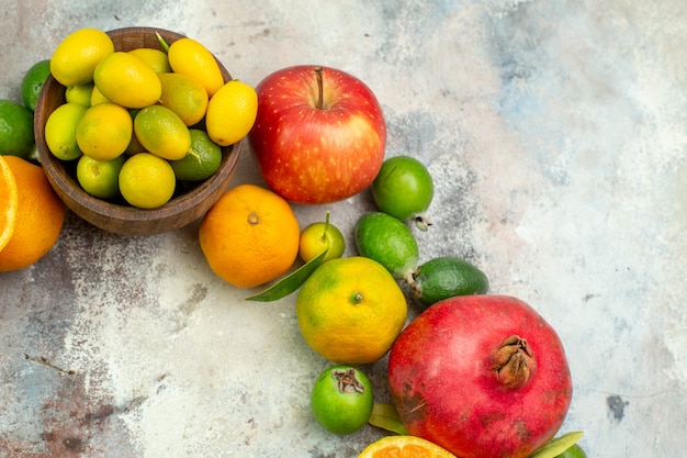 Top view fresh fruits different mellow fruits on white background tree tasty photo ripe color berry citrus