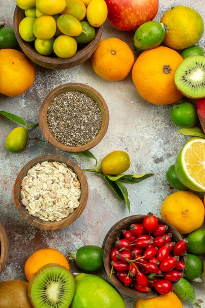 Top view fresh fruits different mellow fruits on the white background tree tasty photo ripe diet color health berry