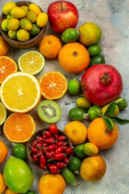 Top view fresh fruits different mellow fruits on white desk tree tasty  ripe diet color health berry citrus