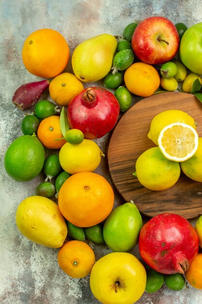 Top view fresh fruits different ripe and mellow fruits on white desk