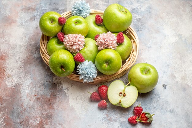 Top view fresh green apples inside basket