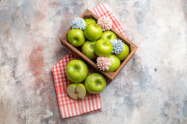 Top view fresh green apples inside box