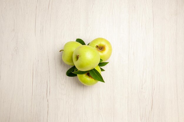 Top view fresh green apples mellow and ripe fruits on white desk plant fruit color fresh green tree