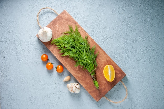 Top view fresh greens on a light background food meal vegetable salad plant