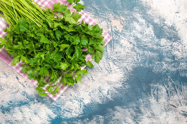 Top view fresh greens on light background