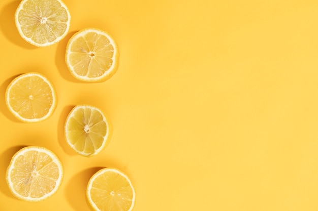 Top view fresh lemon slices on table