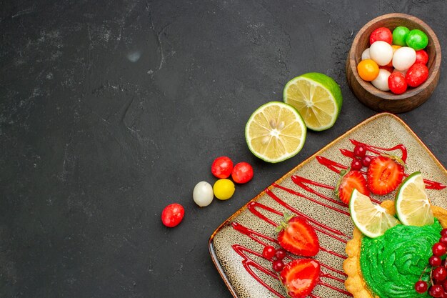 Top view fresh lemon slices with candies