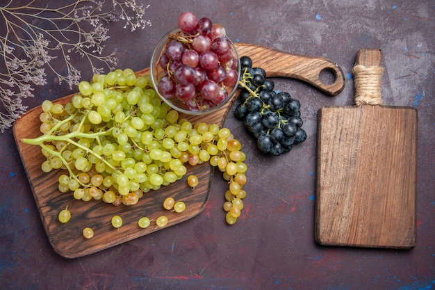 Top view fresh mellow grapes on dark floor wine fresh grape fruit tree plant ripe