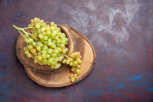 Top view fresh mellow grapes on dark surface wine fresh grape fruit ripe tree plant