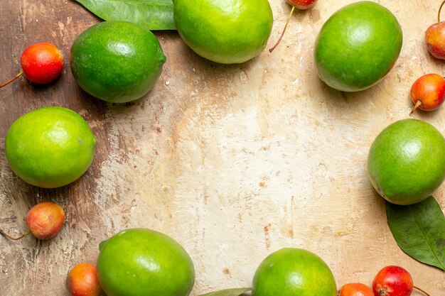 Top view of fresh natural lemons on the left side on colorful background