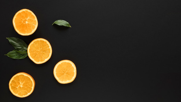 Top view fresh orange slices with copy space