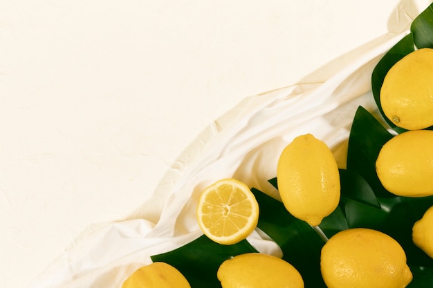 Top view fresh organic lemons on table