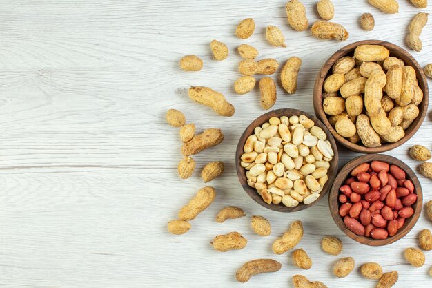 top view fresh peanuts on white table