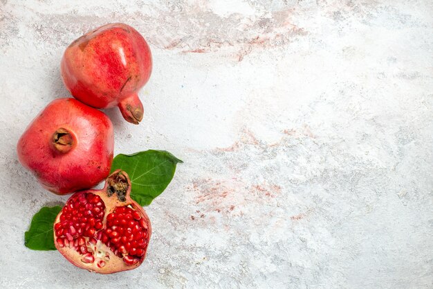 Top view fresh pomegranate on white space