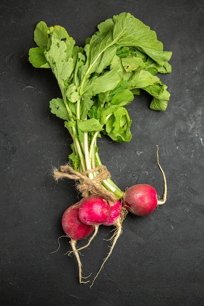 Top view of fresh radish with green leaves
