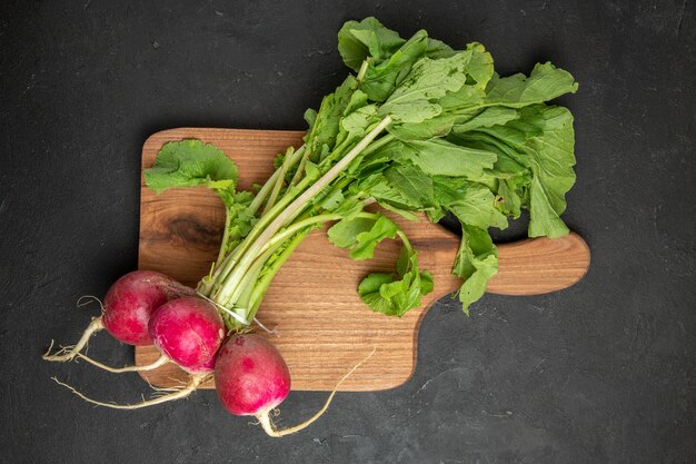 Top view of fresh radish with green leaves