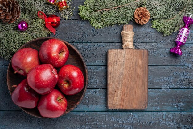 Top view fresh red apples mellow ripe fruits on dark-blue desk plant many fruits vitamine tree red fresh color